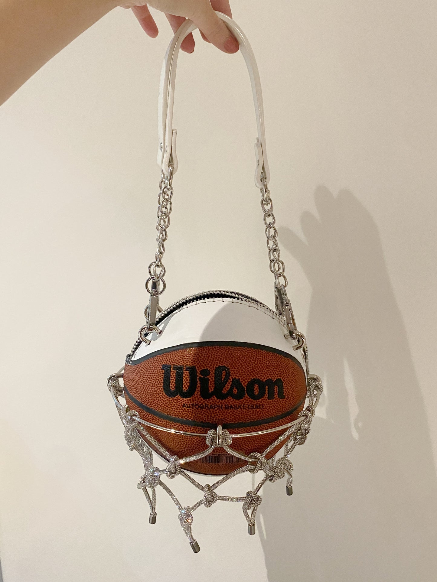 EXCLUSIVE WHITE/BROWN WILSON BASKETBALL W/ NET PURSE